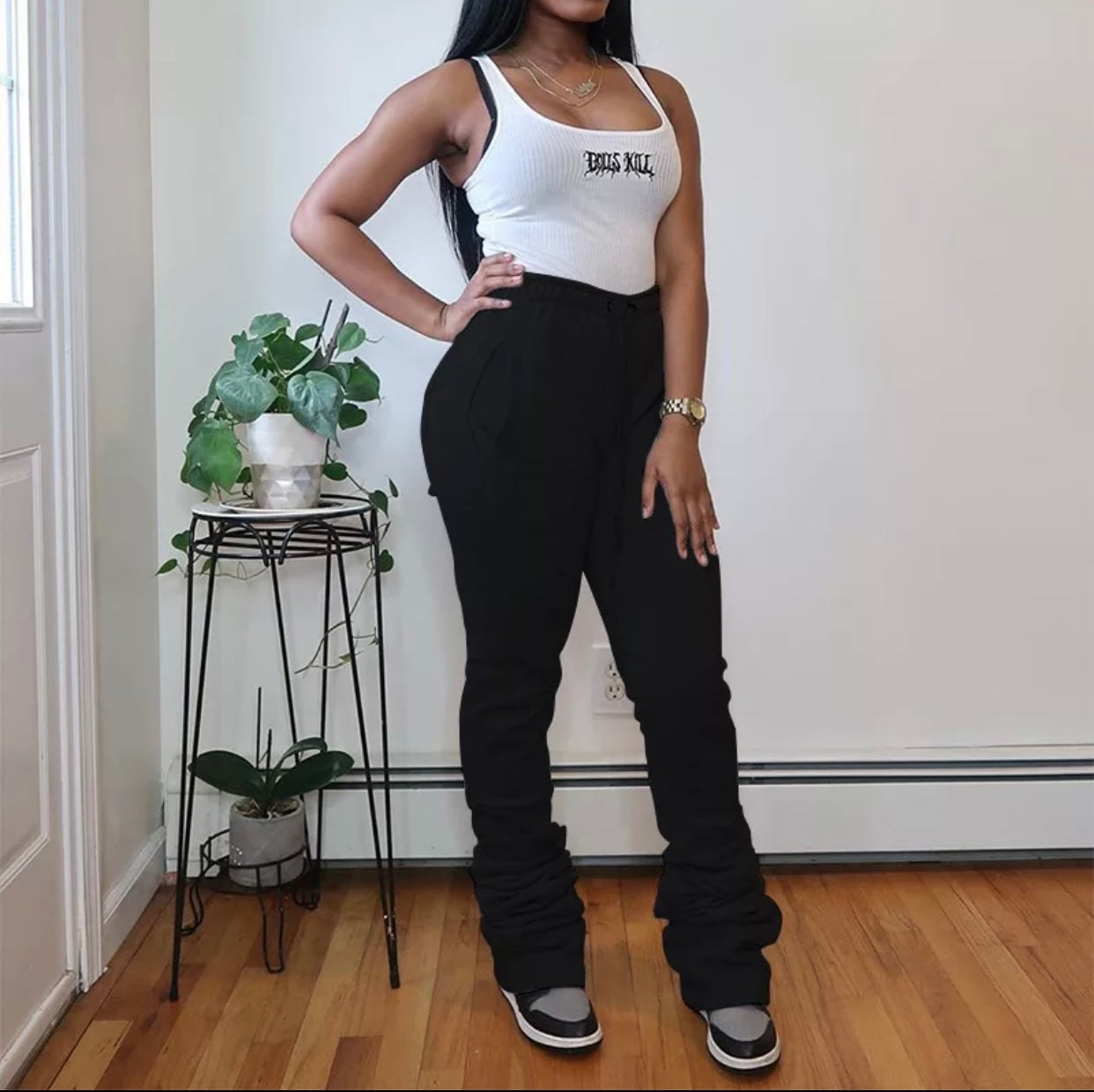 BLACK STACKED PANTS